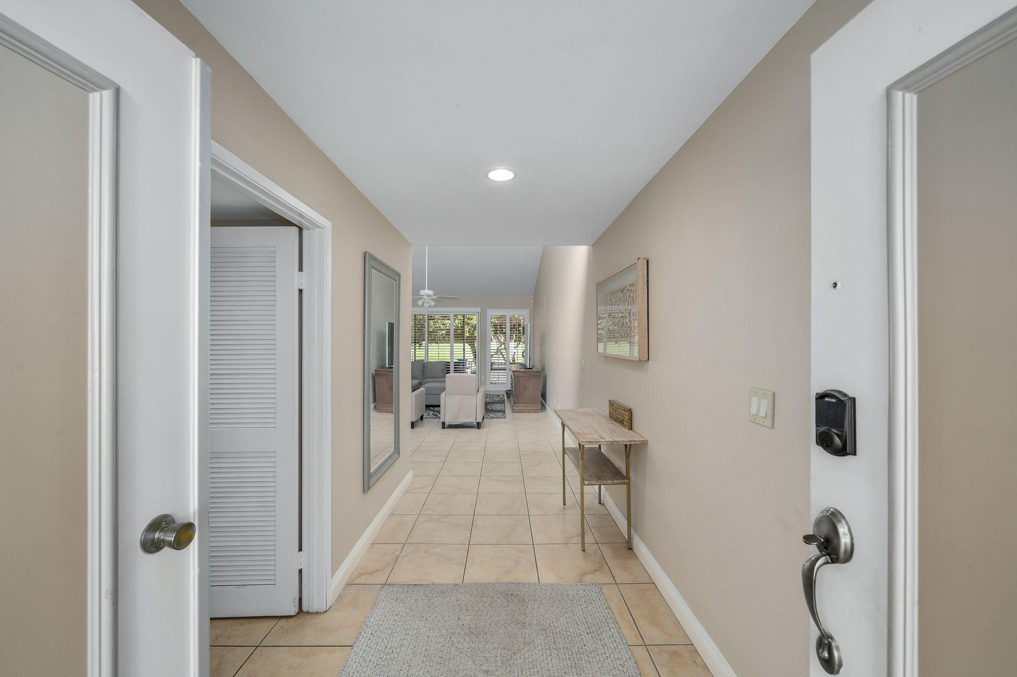 28 Palomas Drive Rancho Mirage, CA 92270 - Photo 5 of 26 a view of a hallway with furniture and front door