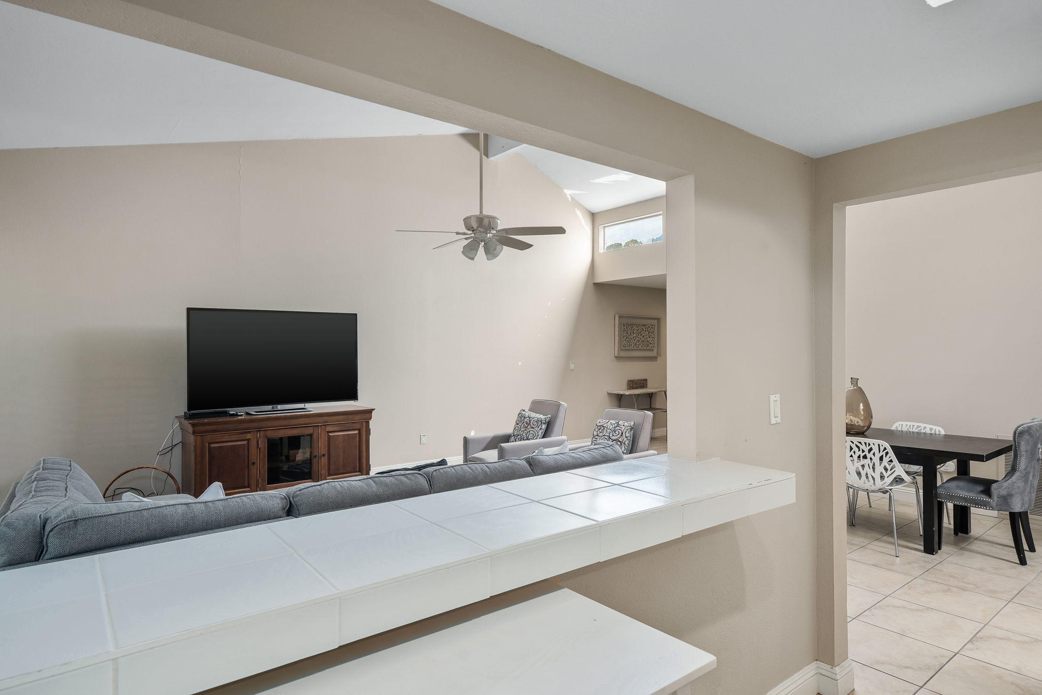 28 Palomas Drive Rancho Mirage, CA 92270 - Photo 10 of 26 a living room with furniture and a flat screen tv
