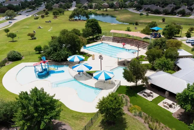 a view of yard with an outdoor seating