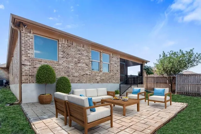 a building outdoor space with patio furniture