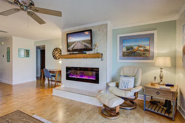 a view of a room with a table and a chair