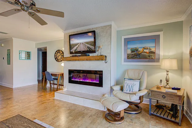 a view of a room with a table and a chair
