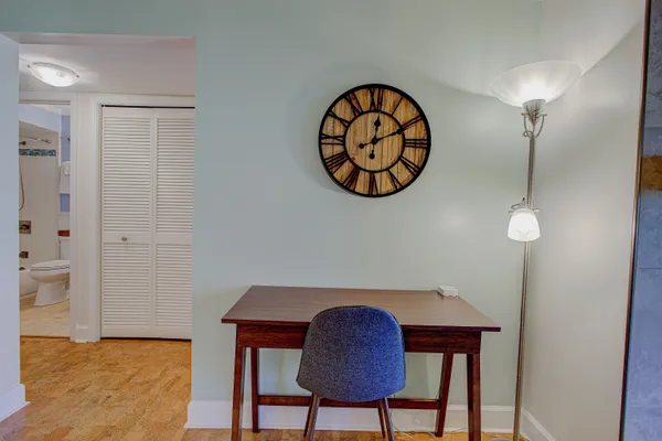 a bedroom with a bed and cupboard