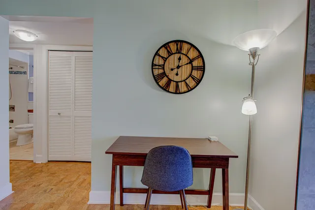 a bedroom with a bed and cupboard