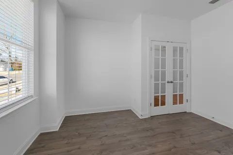 a view of an empty room with a window