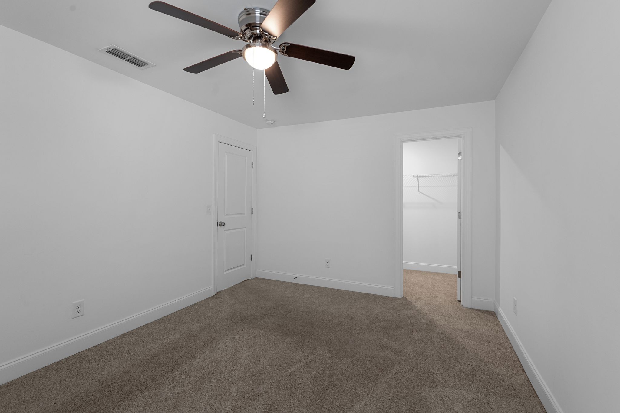9265 Thomason Trail Antioch, TN 37013 - Photo 27 of 35 an empty room with a window and a fan