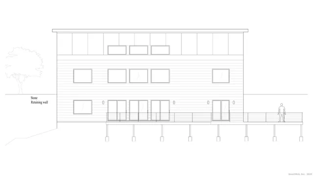 a black and white photo of a white building