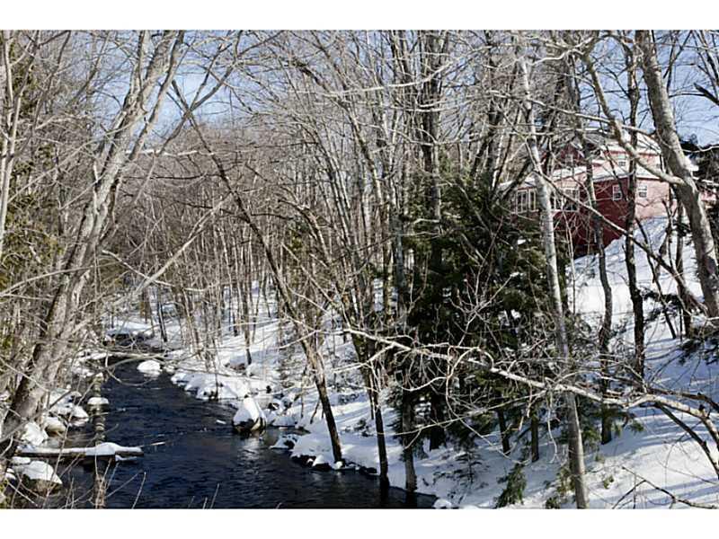 8 Old Hatchery Road Enfield, ME 04493 - Photo 3 of 32 Exterior Back. Trout fishing right...