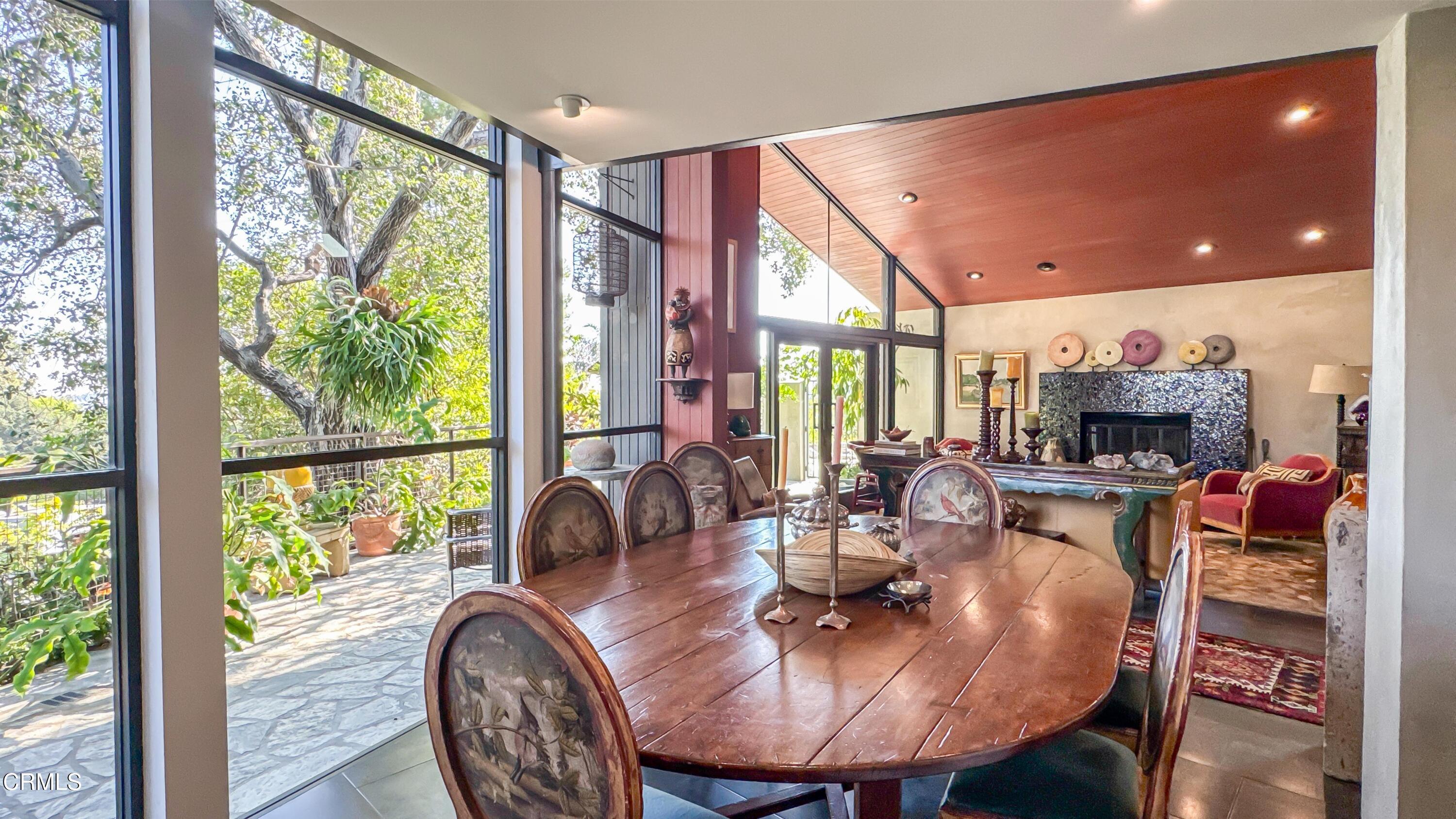 1344 Marianna Road Pasadena, CA 91105 - Photo 11 of 38 a dining room with furniture a window and a view