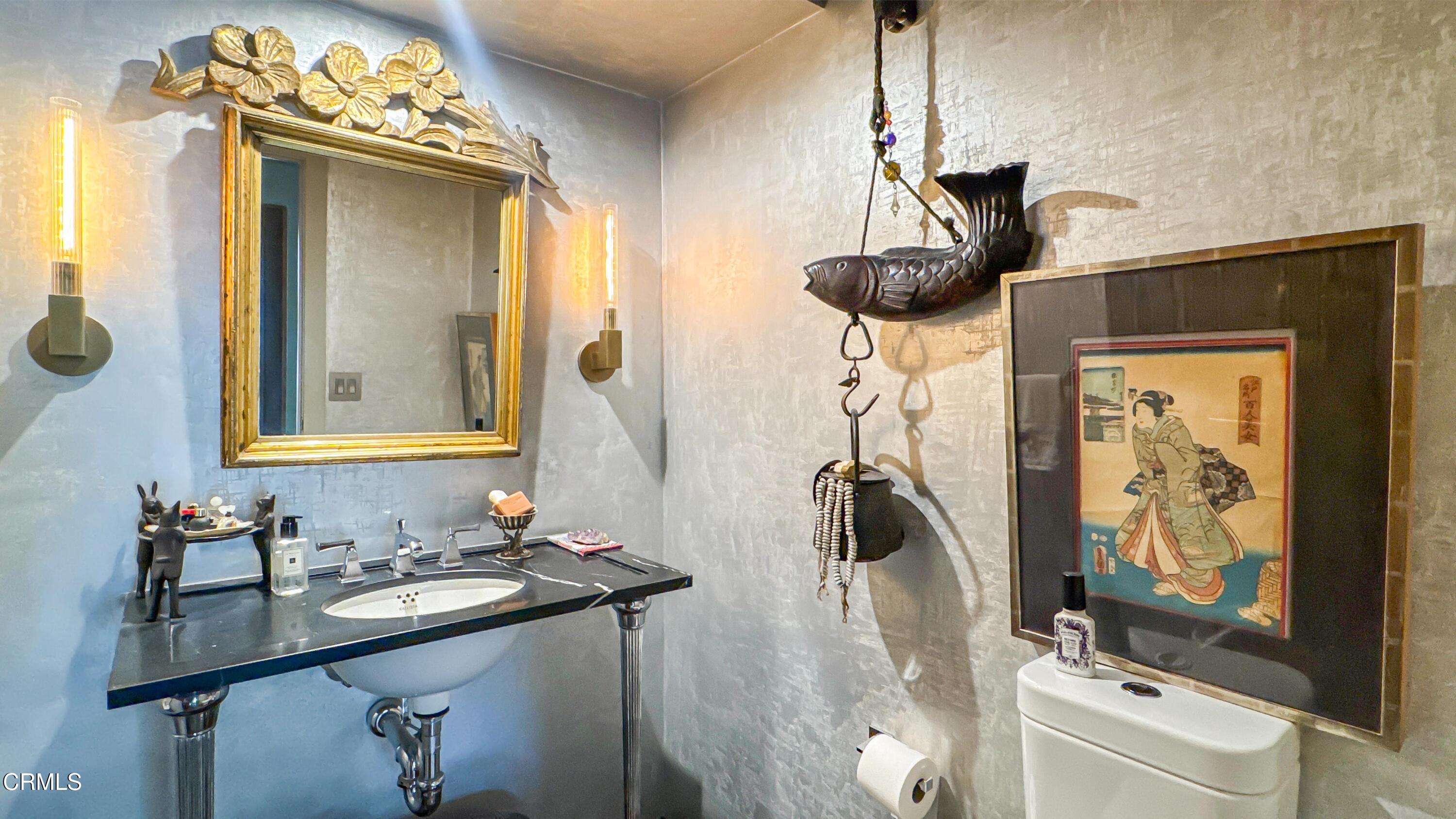 1344 Marianna Road Pasadena, CA 91105 - Photo 17 of 38 a bathroom with a sink a mirror and a window