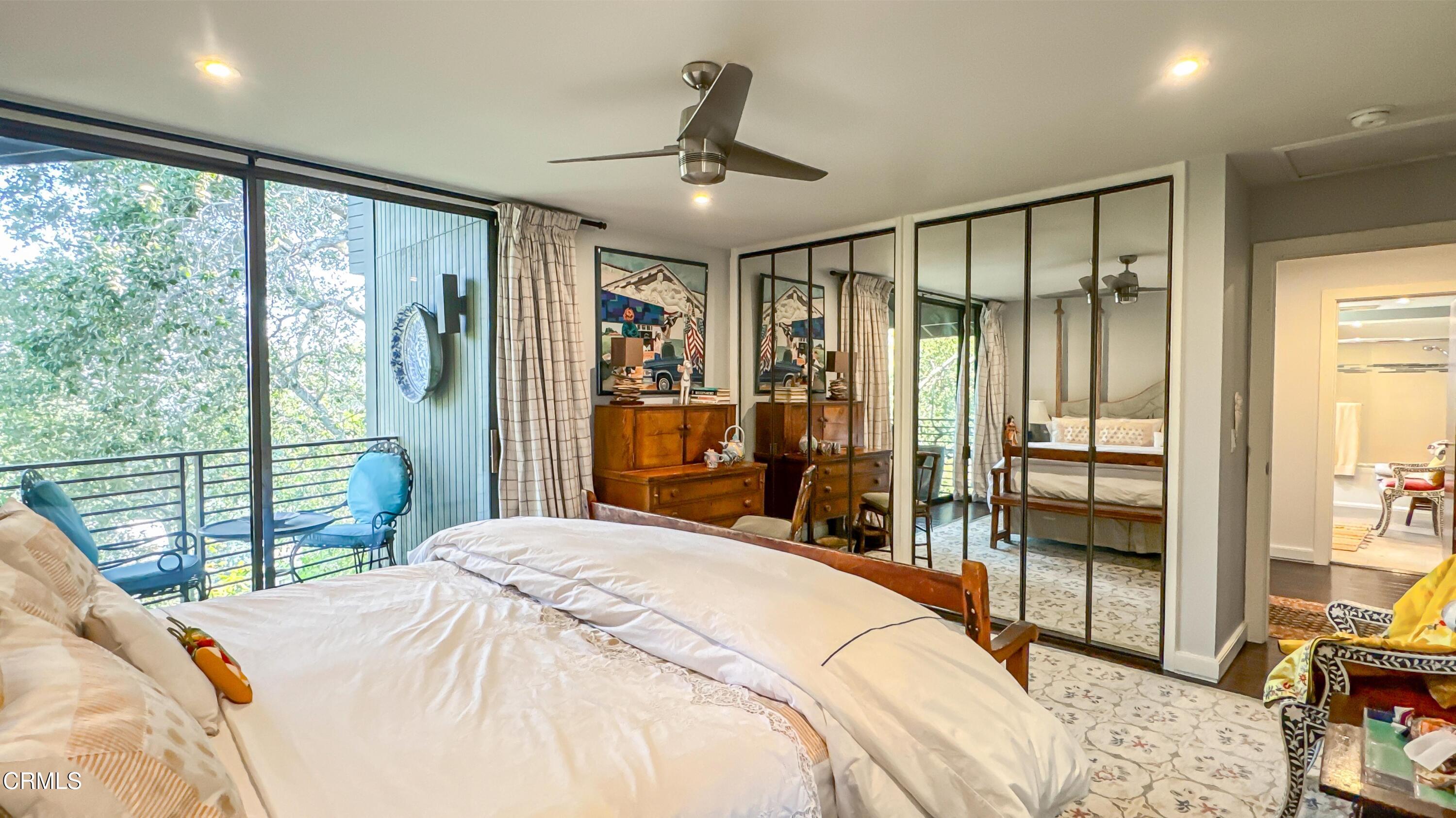 1344 Marianna Road Pasadena, CA 91105 - Photo 27 of 38 a bedroom with a large bed and a large window