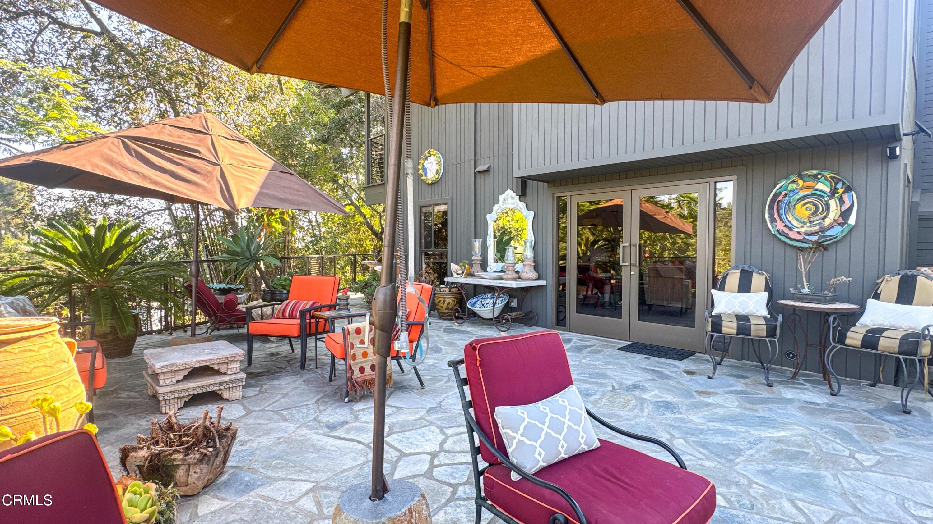 1344 Marianna Road Pasadena, CA 91105 - Photo 31 of 38 a outdoor space with lots of furniture and umbrella