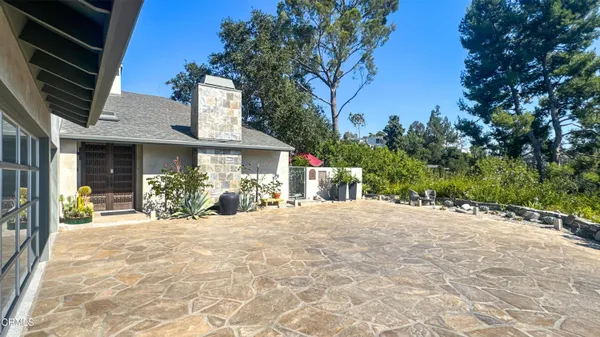 a front view of a house with a outdoor space
