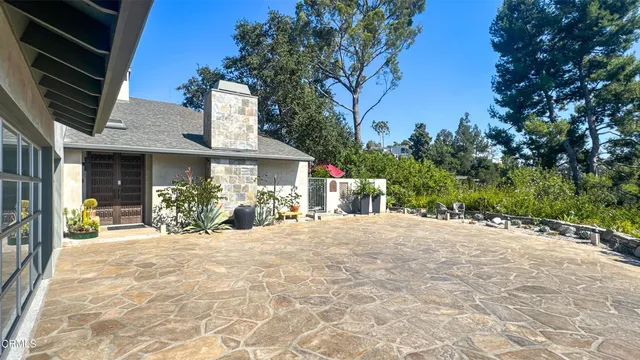 a front view of a house with a outdoor space