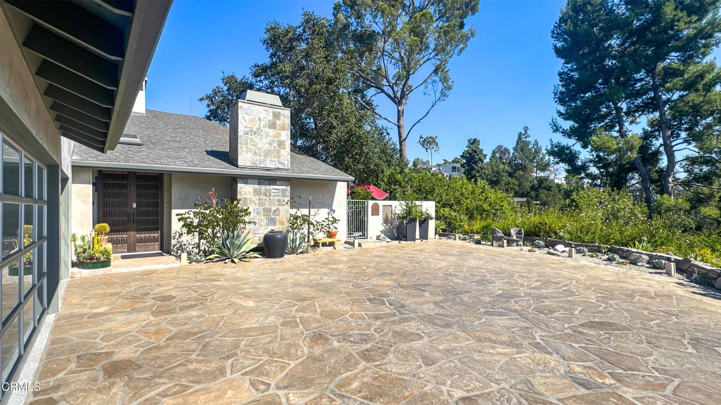 1344 Marianna Road Pasadena, CA 91105 - Photo 4 of 38 a front view of a house with a outdoor space