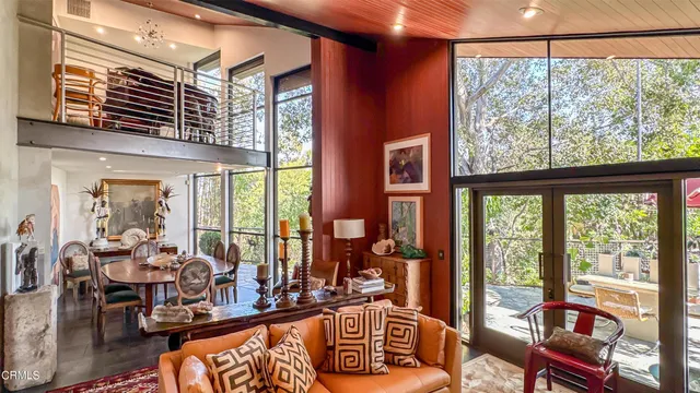 a view of a dining room with furniture window and outside view