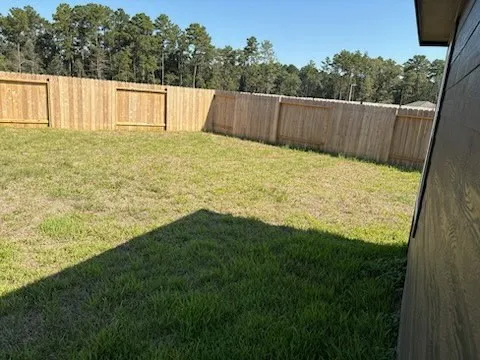 a view of balcony with wooden floor