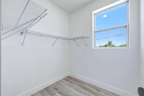 a view of a room with racks on the wall