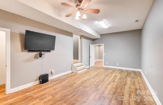 a view of a livingroom with a flat screen tv