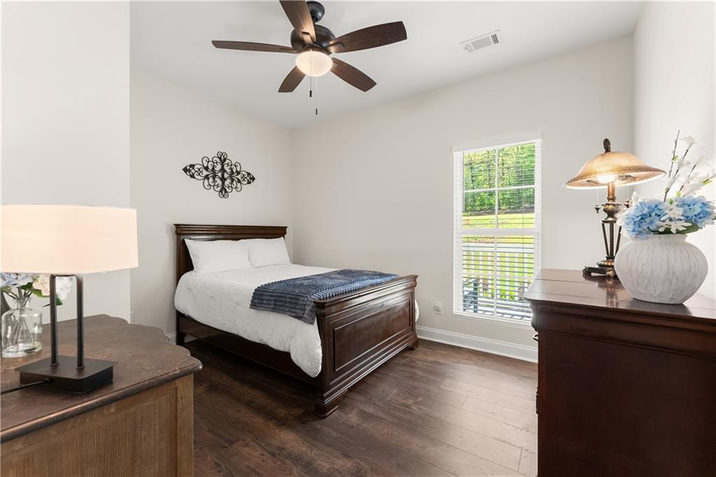 179 Prime Drive Commerce, GA 30530 - Photo 27 of 44 a bedroom with a bed and a window