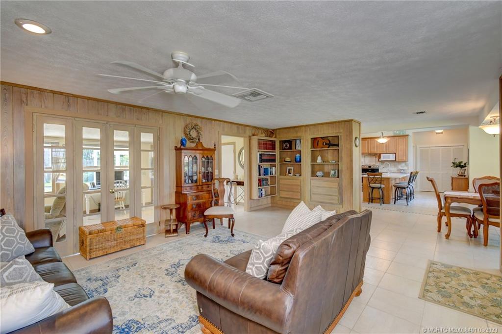 834 Southeast Riverside Drive Stuart, FL 34994 - Photo 12 of 35 French doors to family room.