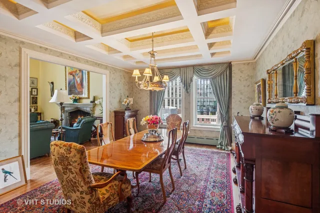 a dining room with furniture window and outdoor view