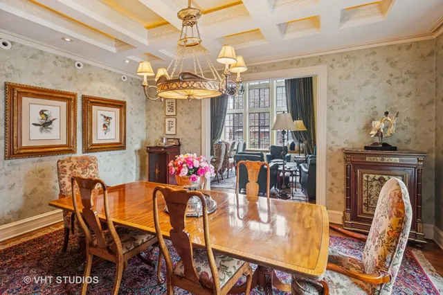 a dining room with furniture and window