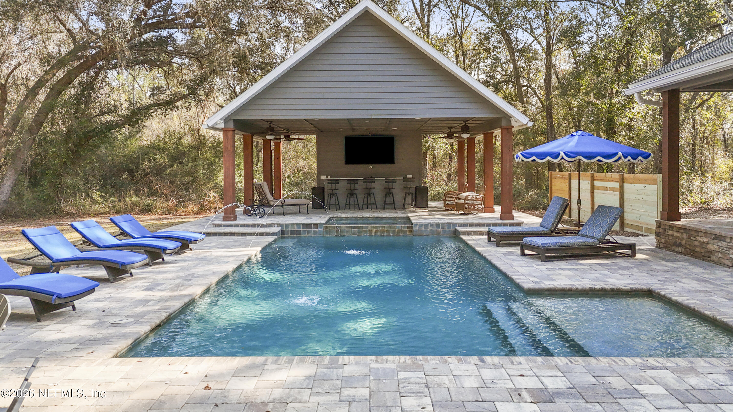 6153 Tim Crews Road Macclenny, FL 32063 - Photo 11 of 79 a view of a house with backyard and sitting area