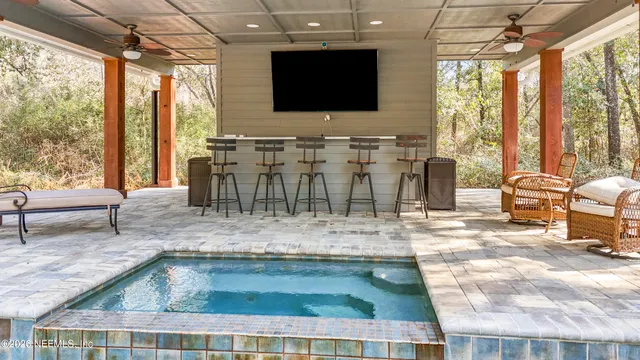 a front view of a residential apartment building with a yard