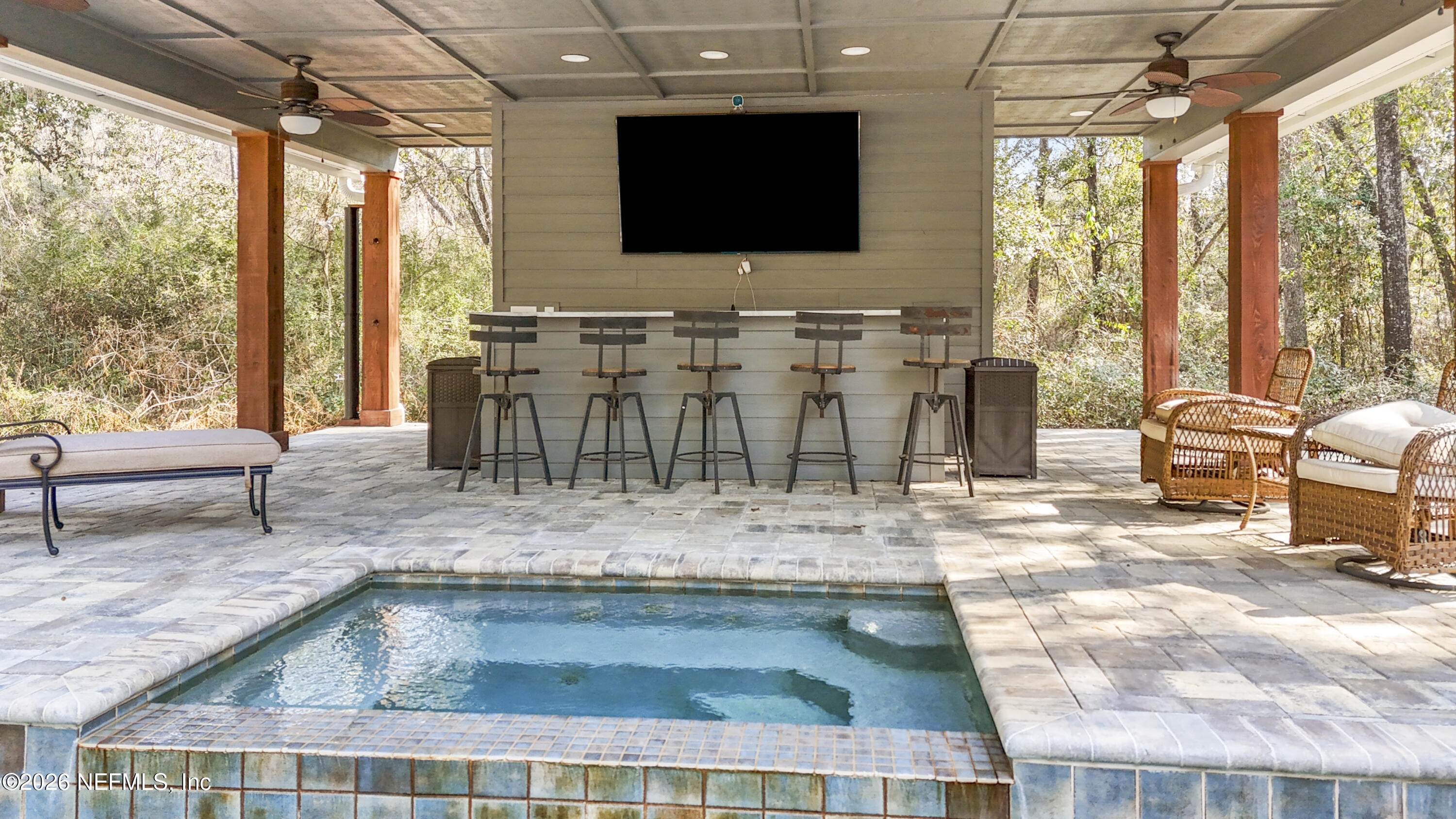 6153 Tim Crews Road Macclenny, FL 32063 - Photo 13 of 79 a living room with furniture and a flat screen tv