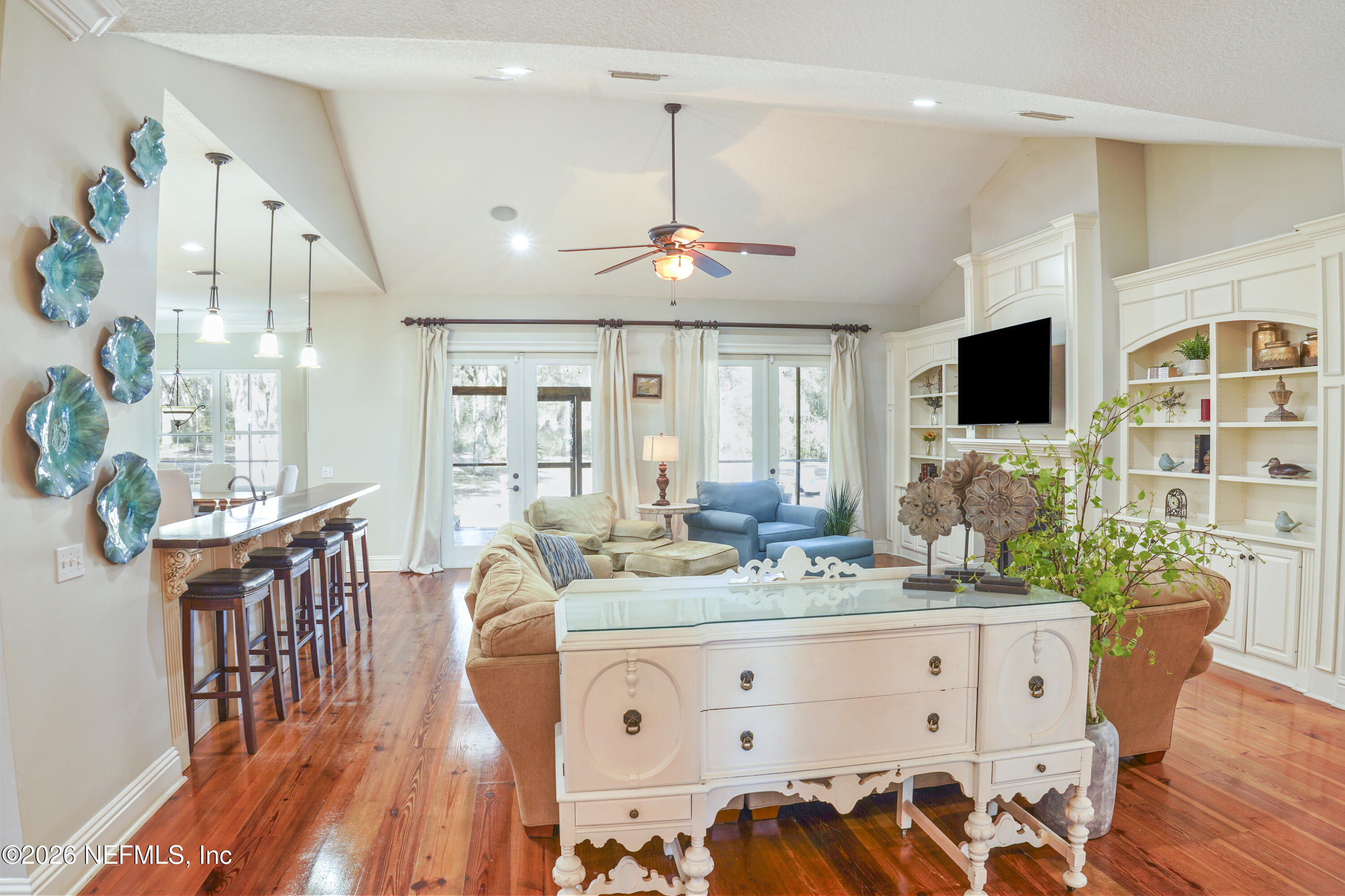 6153 Tim Crews Road Macclenny, FL 32063 - Photo 40 of 79 a view of living room with furniture and a flat screen tv