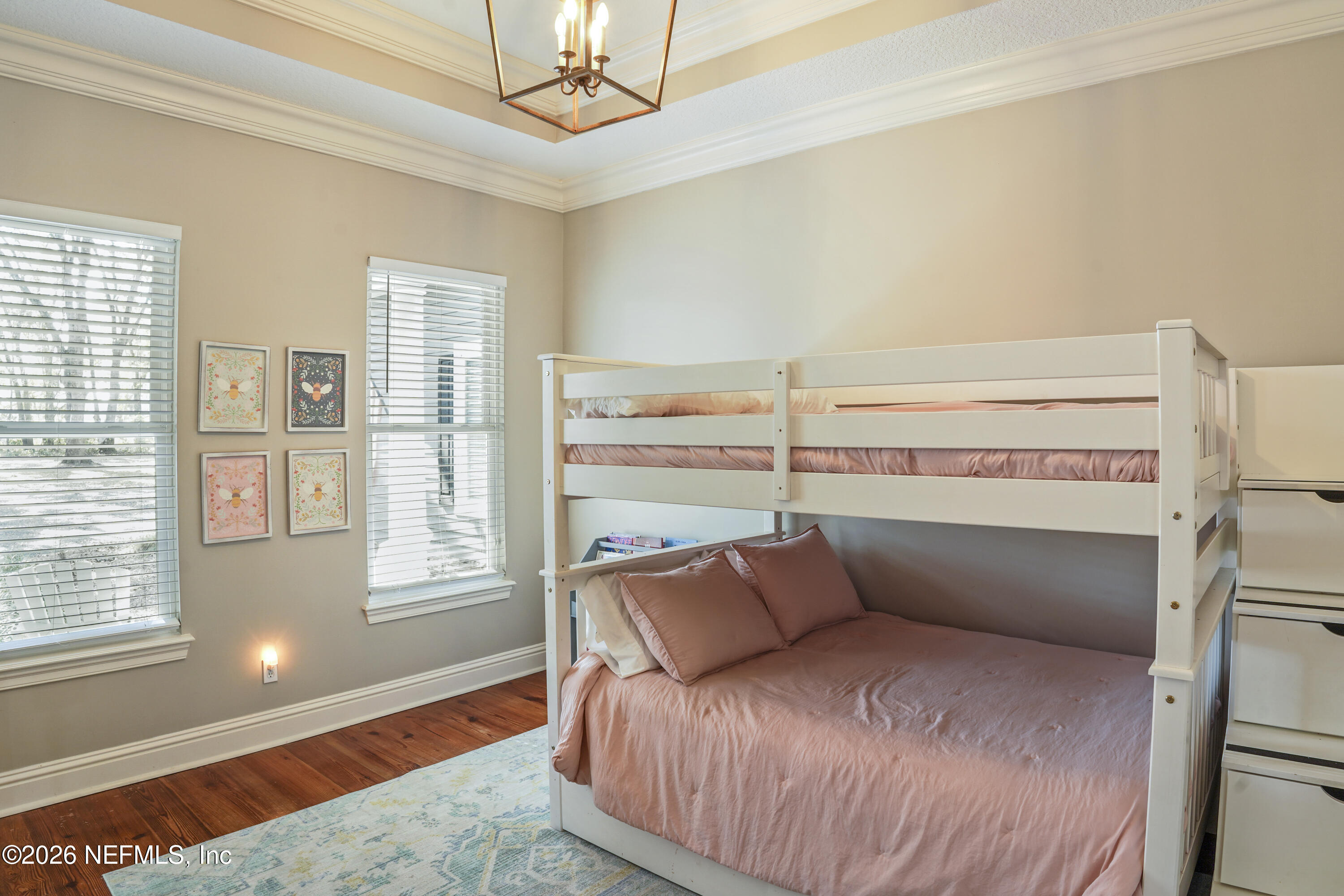 6153 Tim Crews Road Macclenny, FL 32063 - Photo 46 of 79 a bedroom with a bed and wooden floor