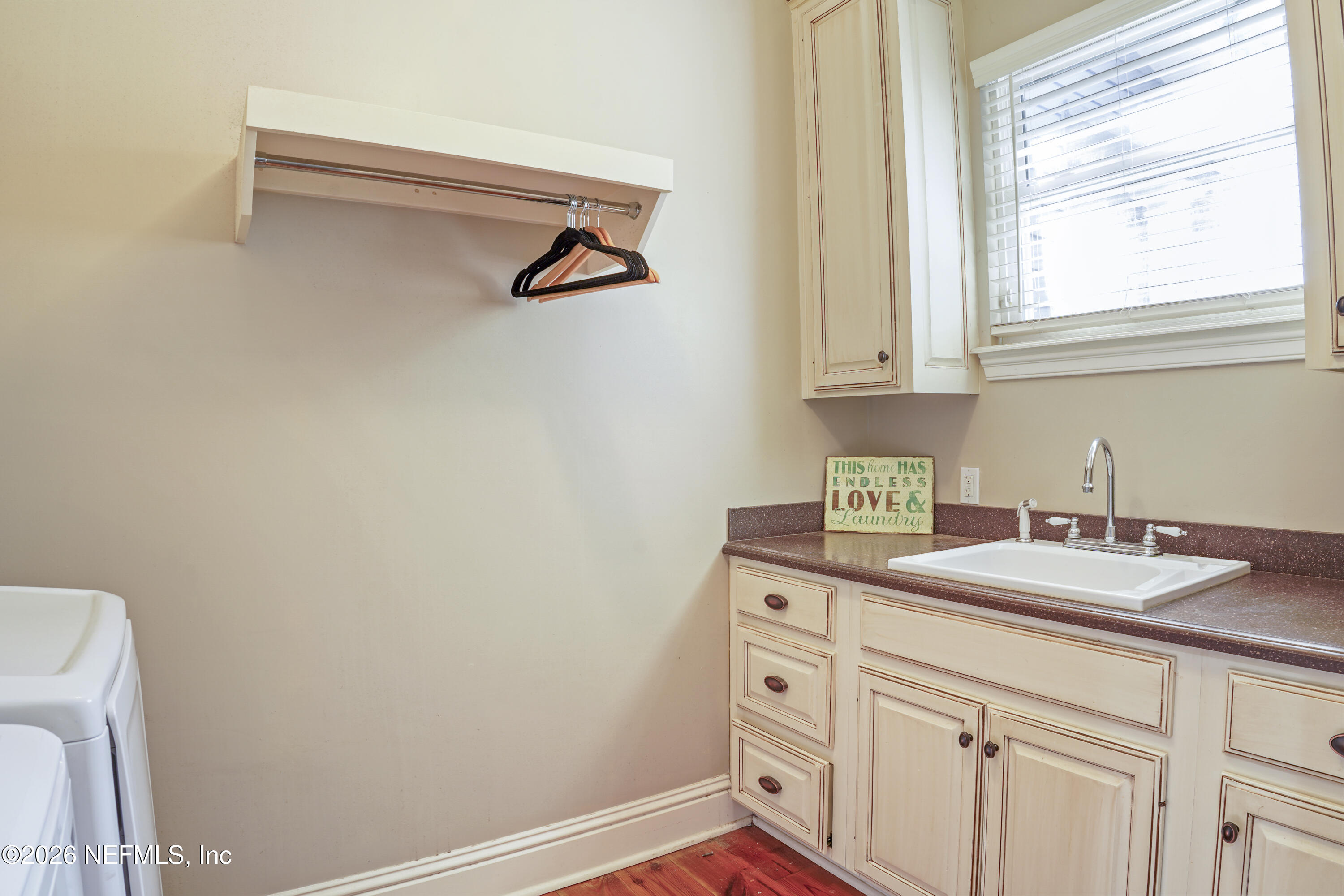 6153 Tim Crews Road Macclenny, FL 32063 - Photo 51 of 79 a bathroom with a sink and a window