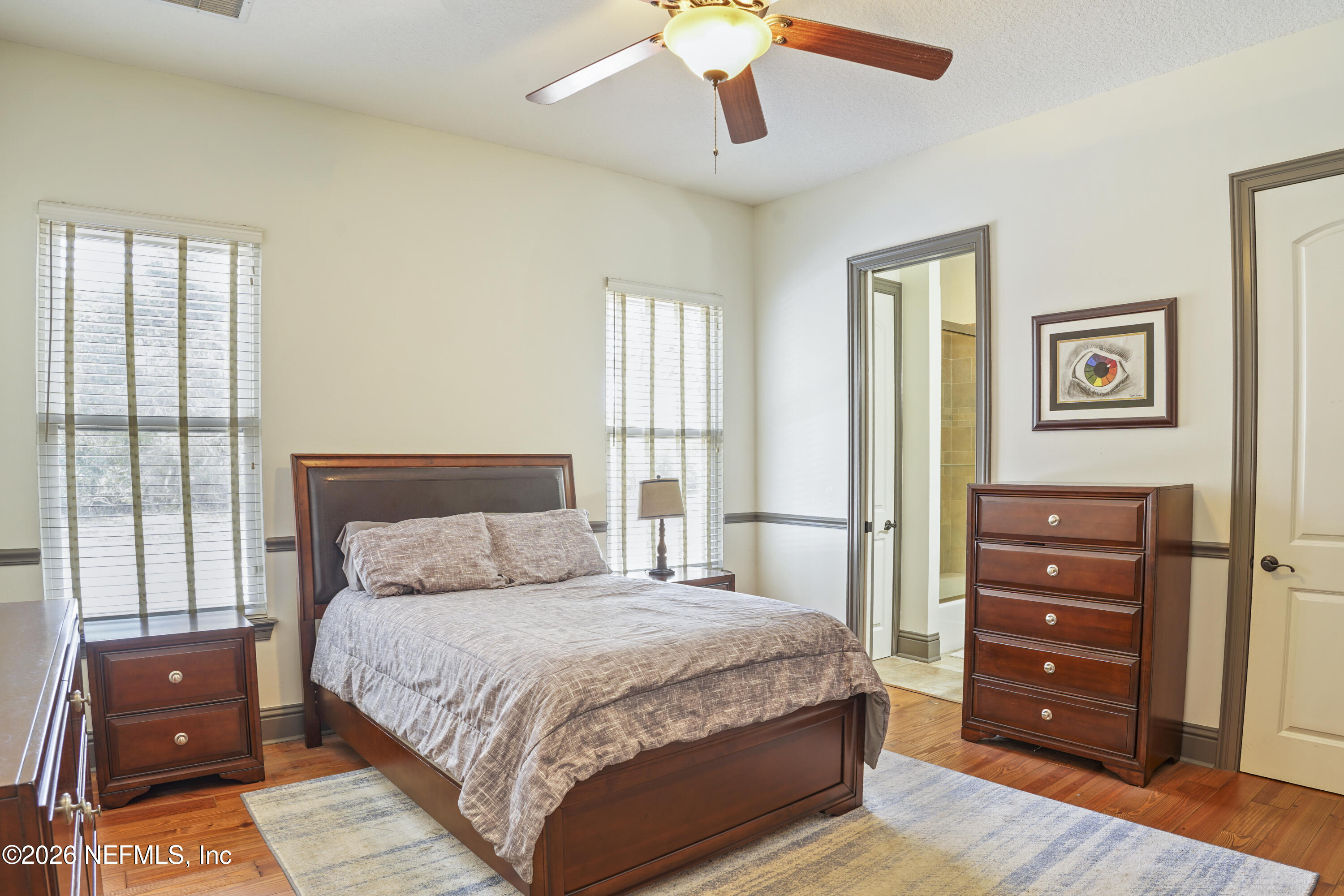 6153 Tim Crews Road Macclenny, FL 32063 - Photo 52 of 79 a bedroom with a bed and a closet