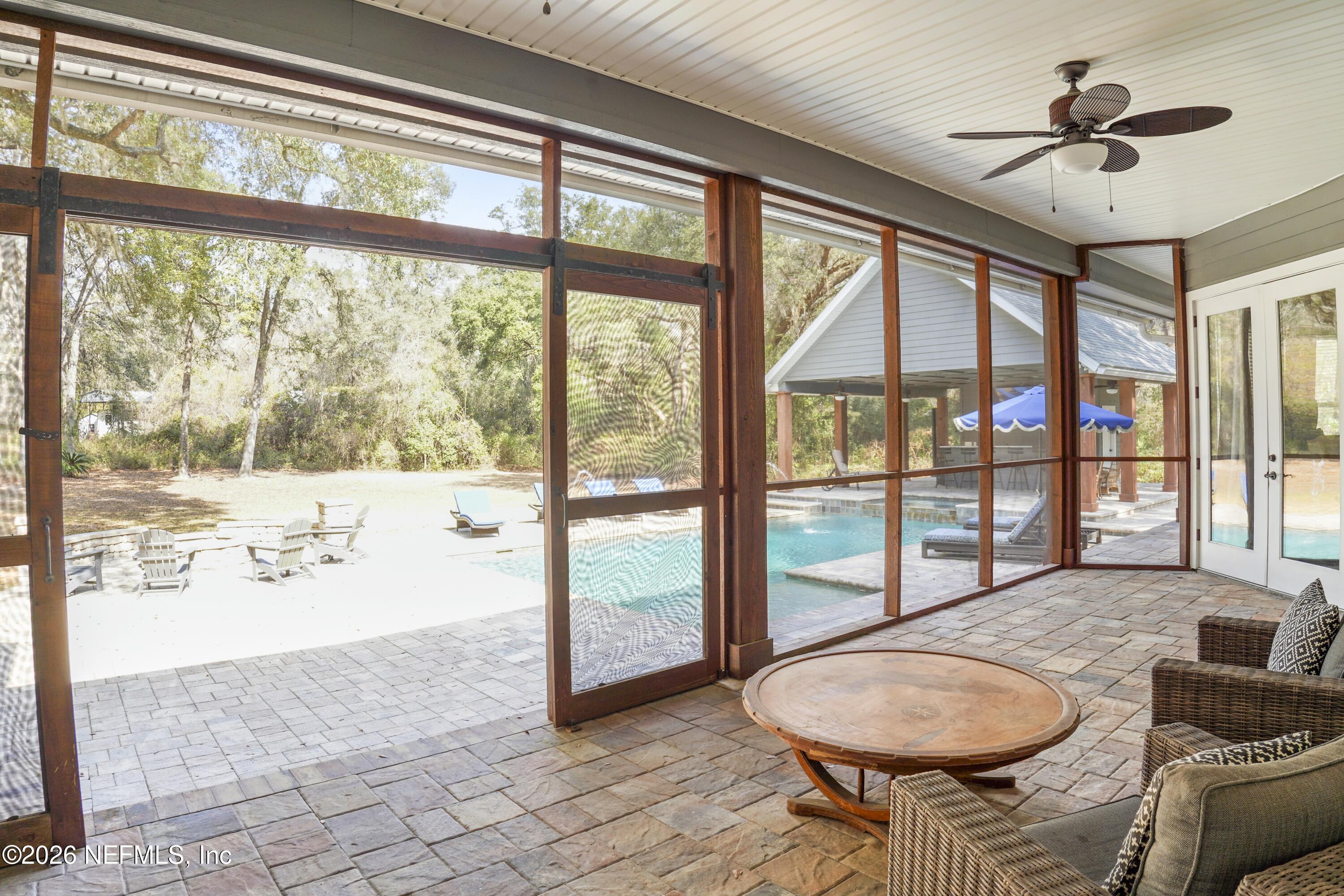 6153 Tim Crews Road Macclenny, FL 32063 - Photo 74 of 79 a living room with furniture and a large window