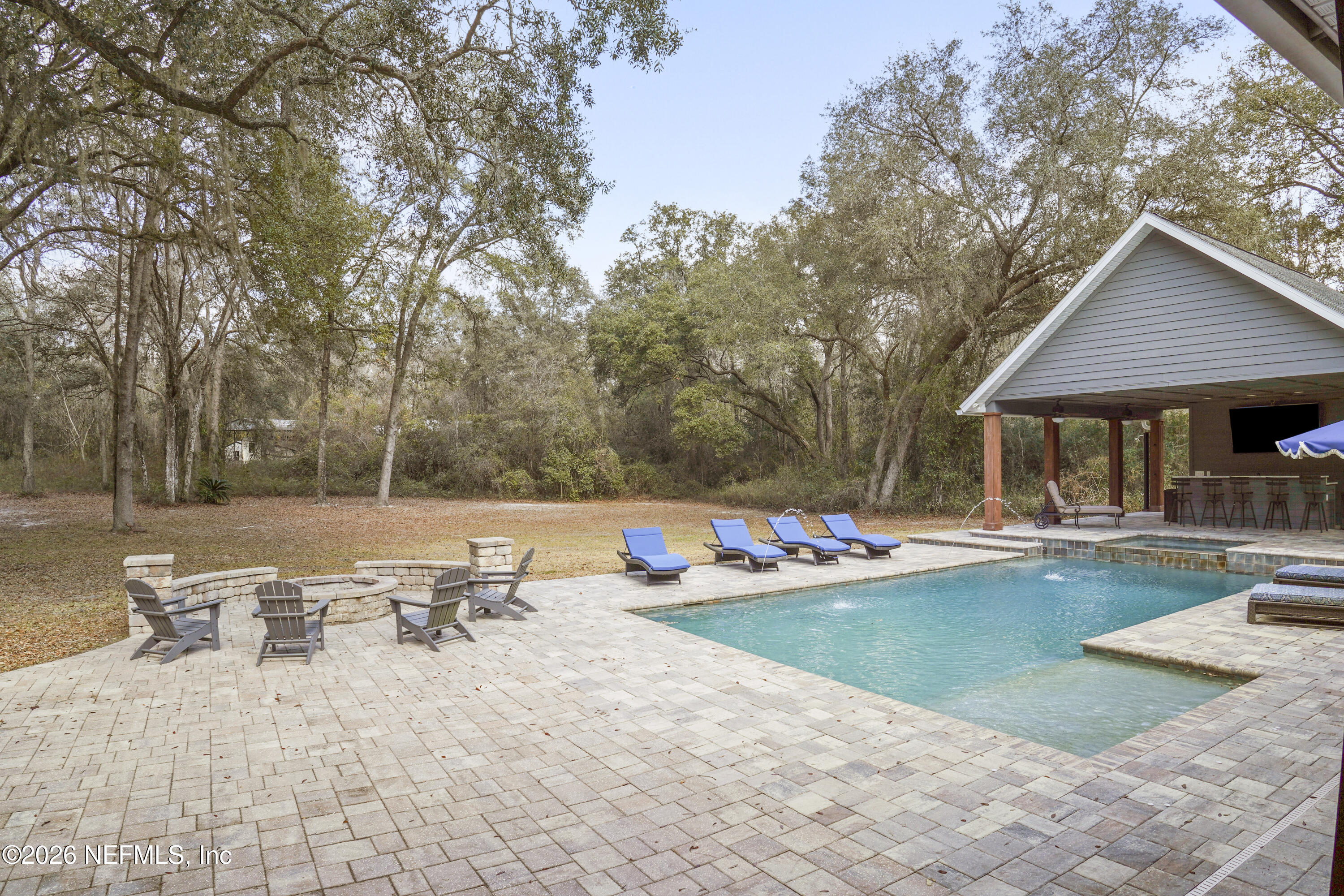 6153 Tim Crews Road Macclenny, FL 32063 - Photo 75 of 79 a view of a house with swimming pool and sitting area
