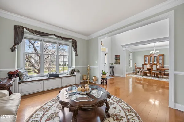 a kitchen with granite countertop a sink a counter space appliances and cabinets