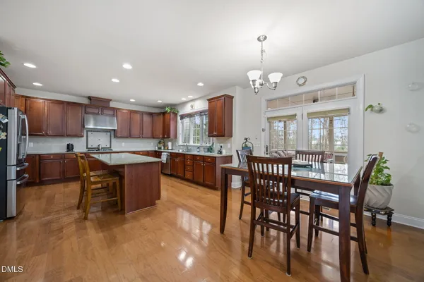 a bathroom with a shower a toilet and a shower