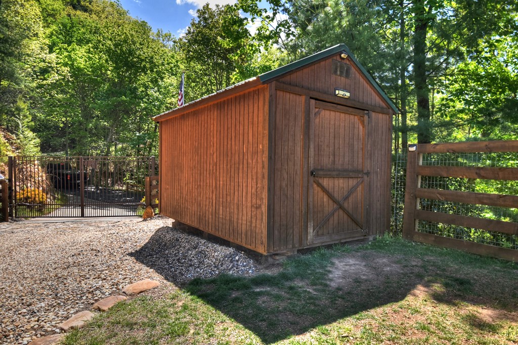 459 Quail Ridge Road Epworth, GA 30541 - Photo 72 of 73 a backyard of a house with lots of green space