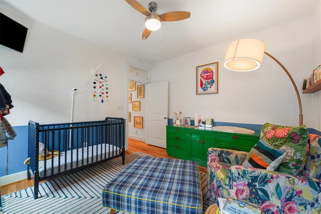 a living room with lots of furniture and a flat screen tv