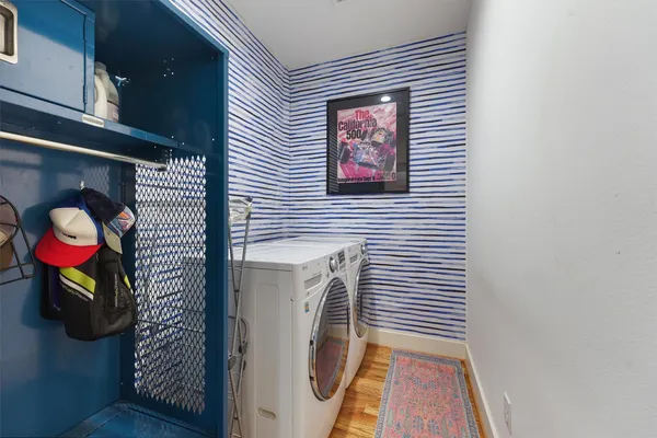 a view of a patio with a table and chairs