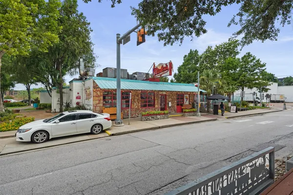a view of street and sign board