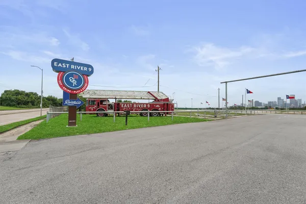 a view of street with parked cars