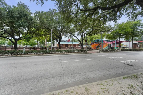 a road with view of building in the background