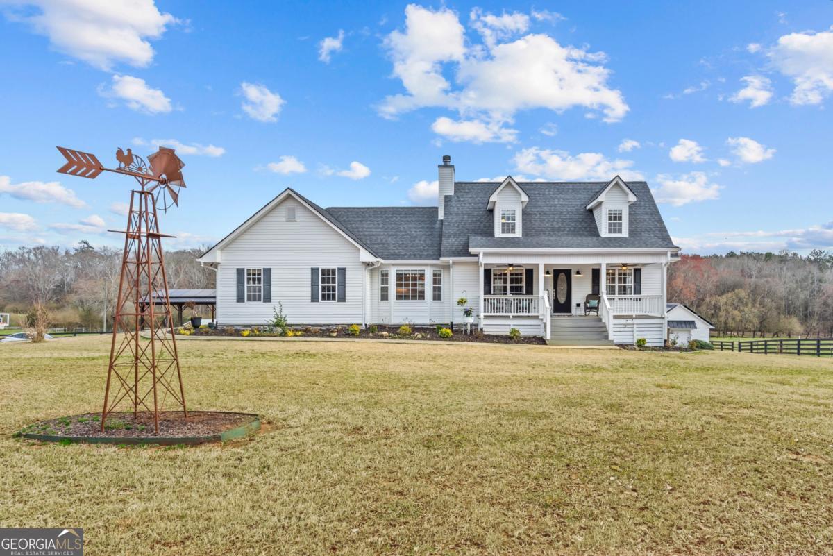 1300 Baldwin Dairy Road Buckhead, GA 30625 - Photo 1 of 1 a front view of a house with a yard