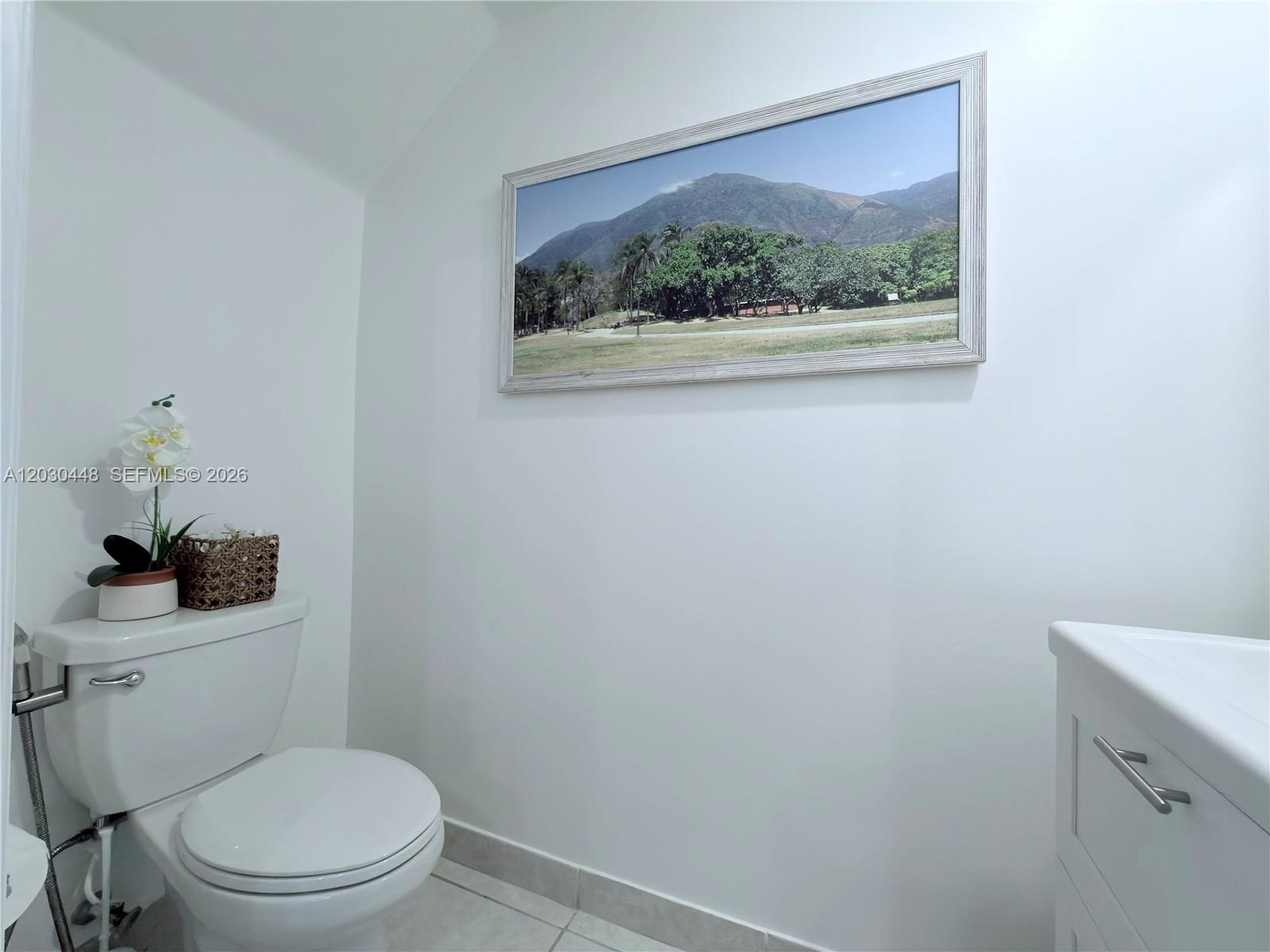 20784 Northeast 5th Court, Unit 20784 Miami, FL 33179 - Photo 10 of 35 Half bathroom downstairs.
