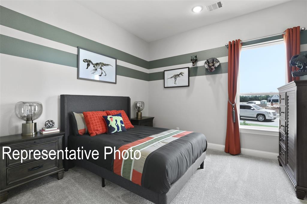 331 Fire Blade Drive Aledo, TX 76008 - Photo 15 of 17 Carpeted bedroom with a large window, recessed lighting, and wall-mounted air vent