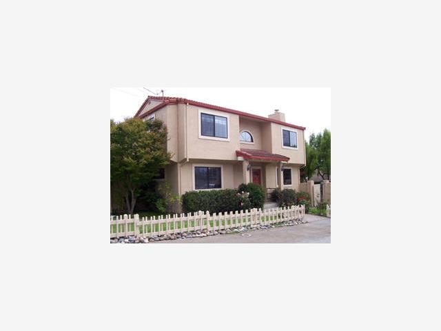 a view of a building with a street