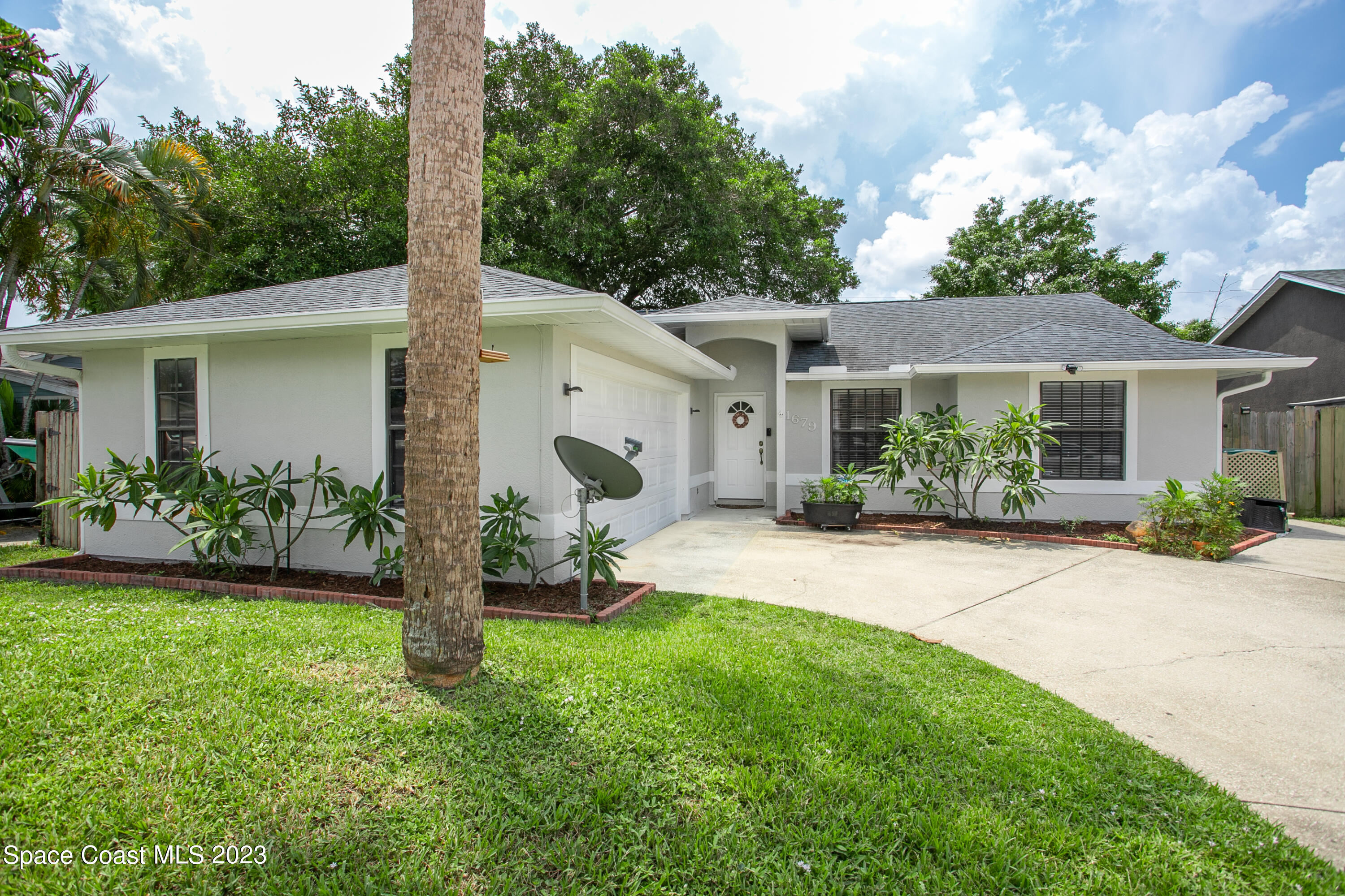 1679 Palm Ridge Road Melbourne, FL 32935 - Photo 2 of 28 Front of House