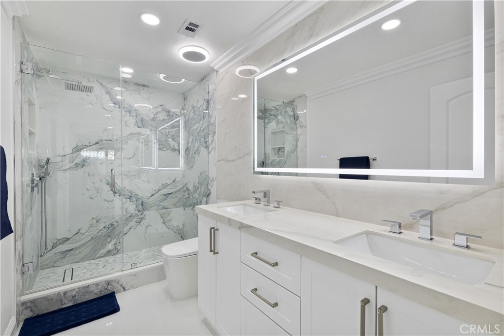 3004 Cardamon Street Rialto, CA 92376 - Photo 32 of 60 Primary Bath featuring Full Porcelain Slab Walk-In Shower